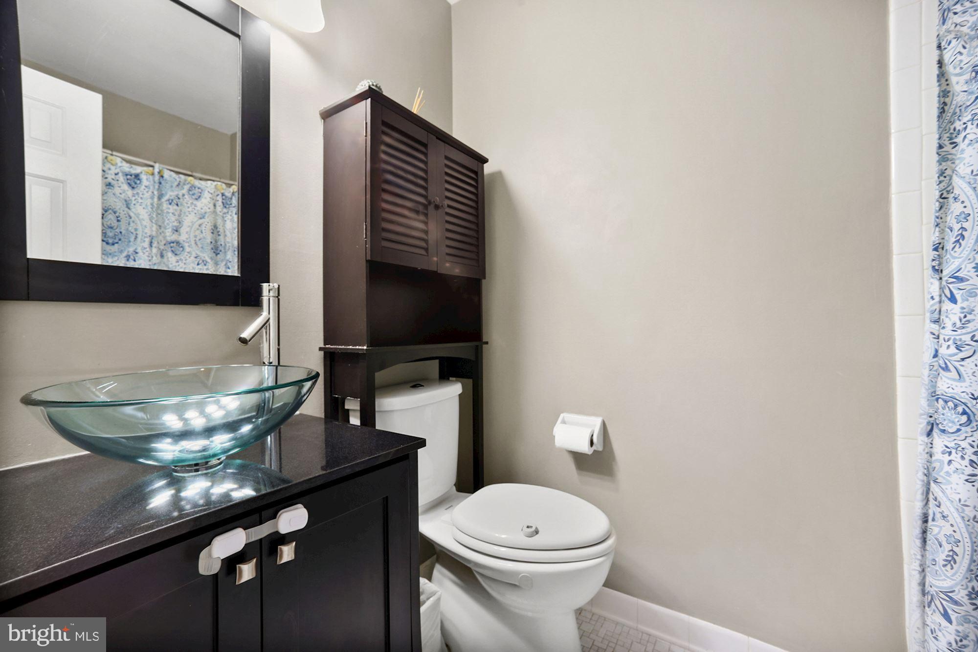 8429 Oak Stream Drive Laurel, MD 20708 - Photo 22 of 37 Hallway full bathroom has fresh updates