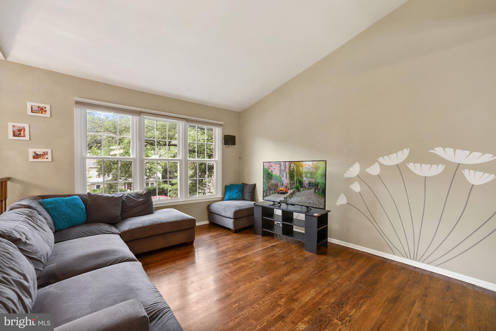 8429 Oak Stream Drive Laurel, MD 20708 - Photo 7 of 37 Living room features hardwood floors