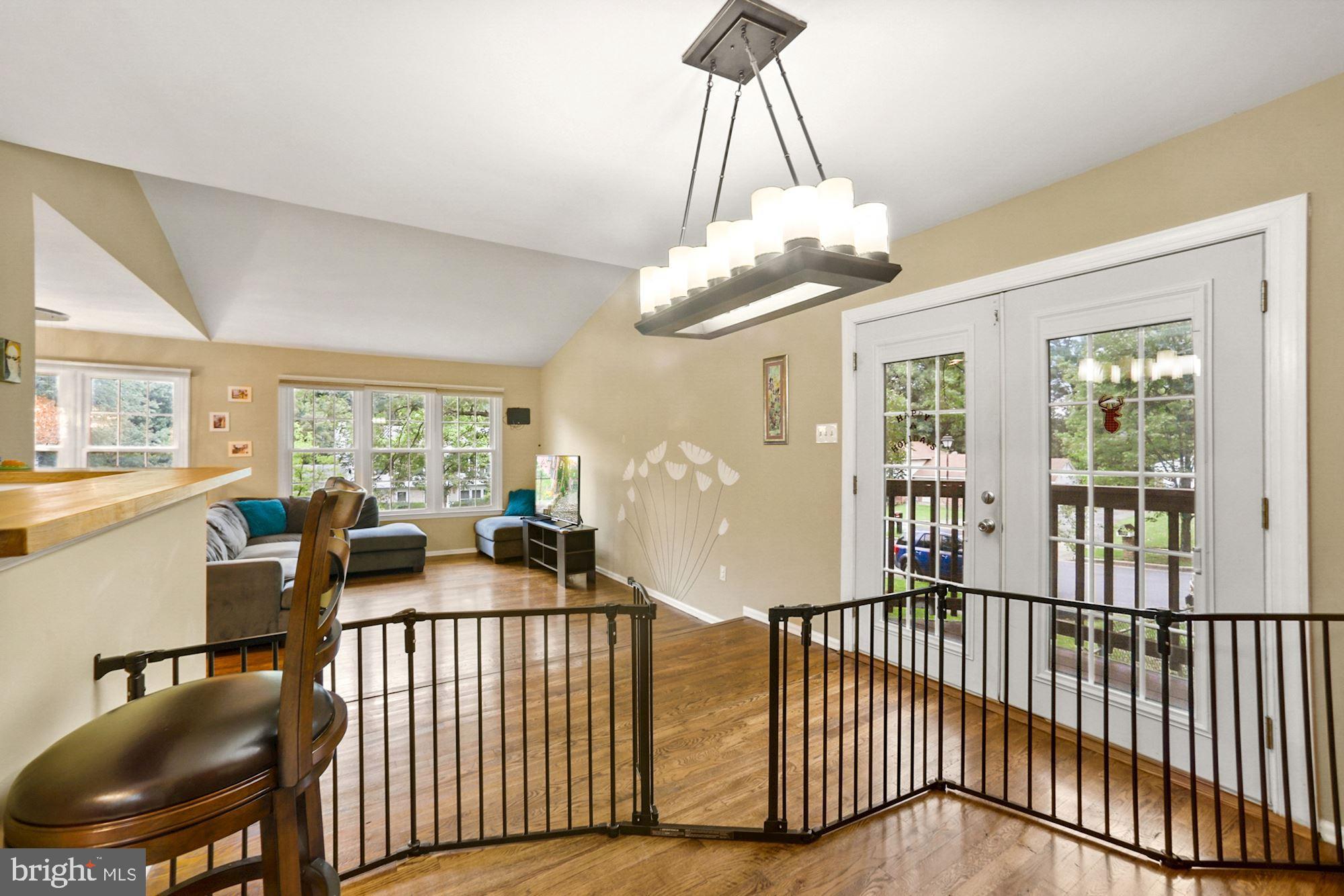8429 Oak Stream Drive Laurel, MD 20708 - Photo 10 of 37 Dining room lead to french doors to deck