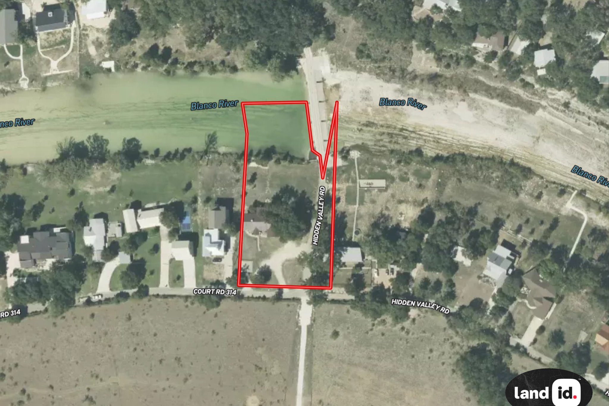 2411 Spoke Hollow Road Wimberley, TX 78676 - Photo 37 of 37 An aerial view highlights the expansive lot with Blanco River frontage and convenient road access.