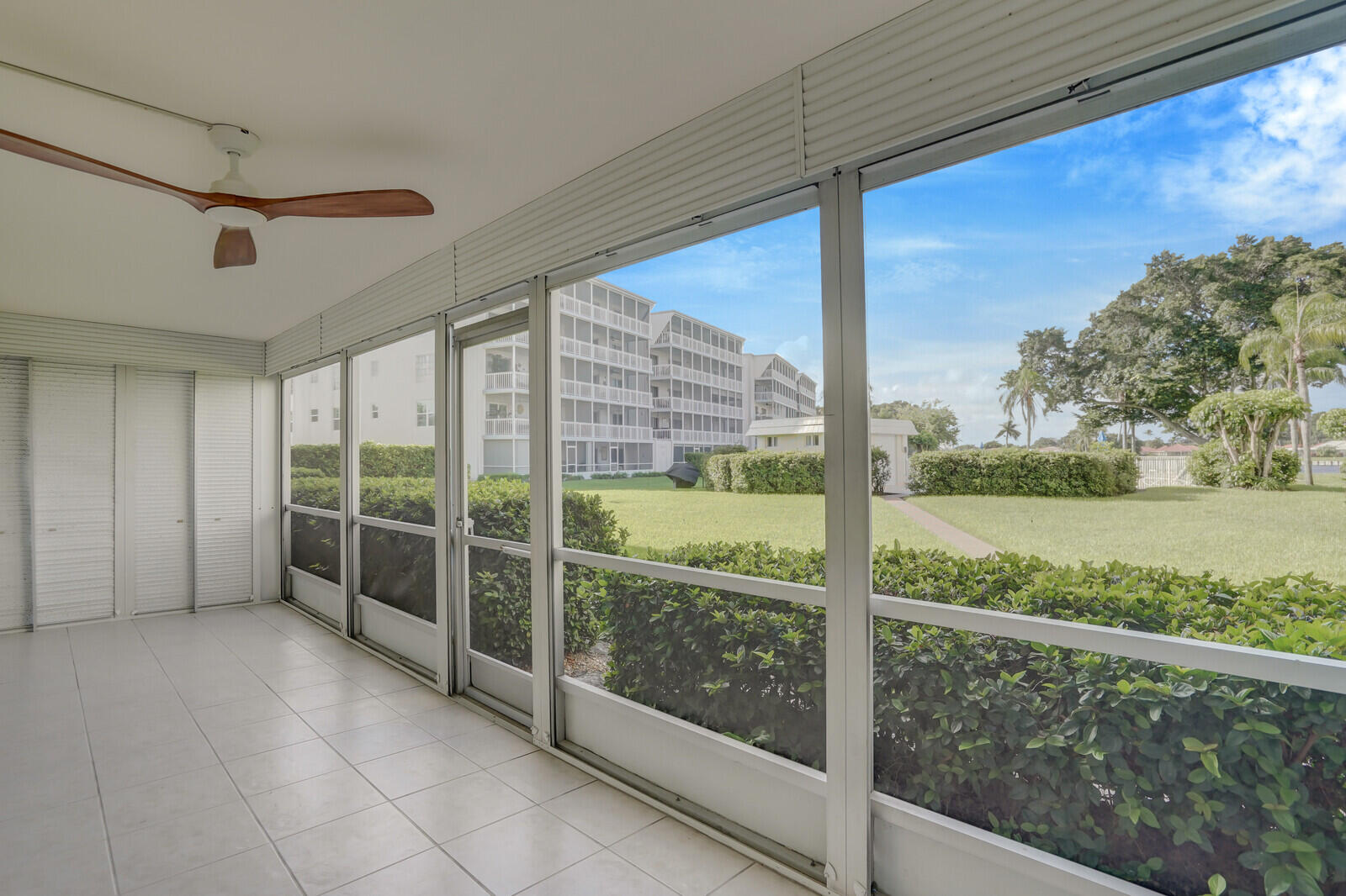 145 Atlantis Boulevard, Unit 104 Atlantis, FL 33462 - Photo 36 of 49 a view of a porch