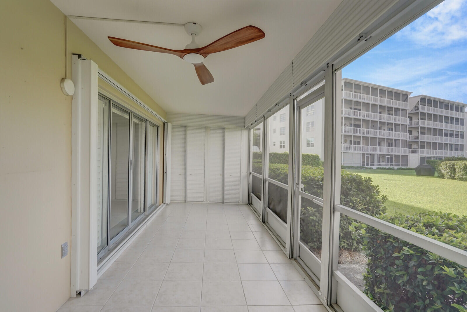 145 Atlantis Boulevard, Unit 104 Atlantis, FL 33462 - Photo 37 of 49 a view of an empty room and window