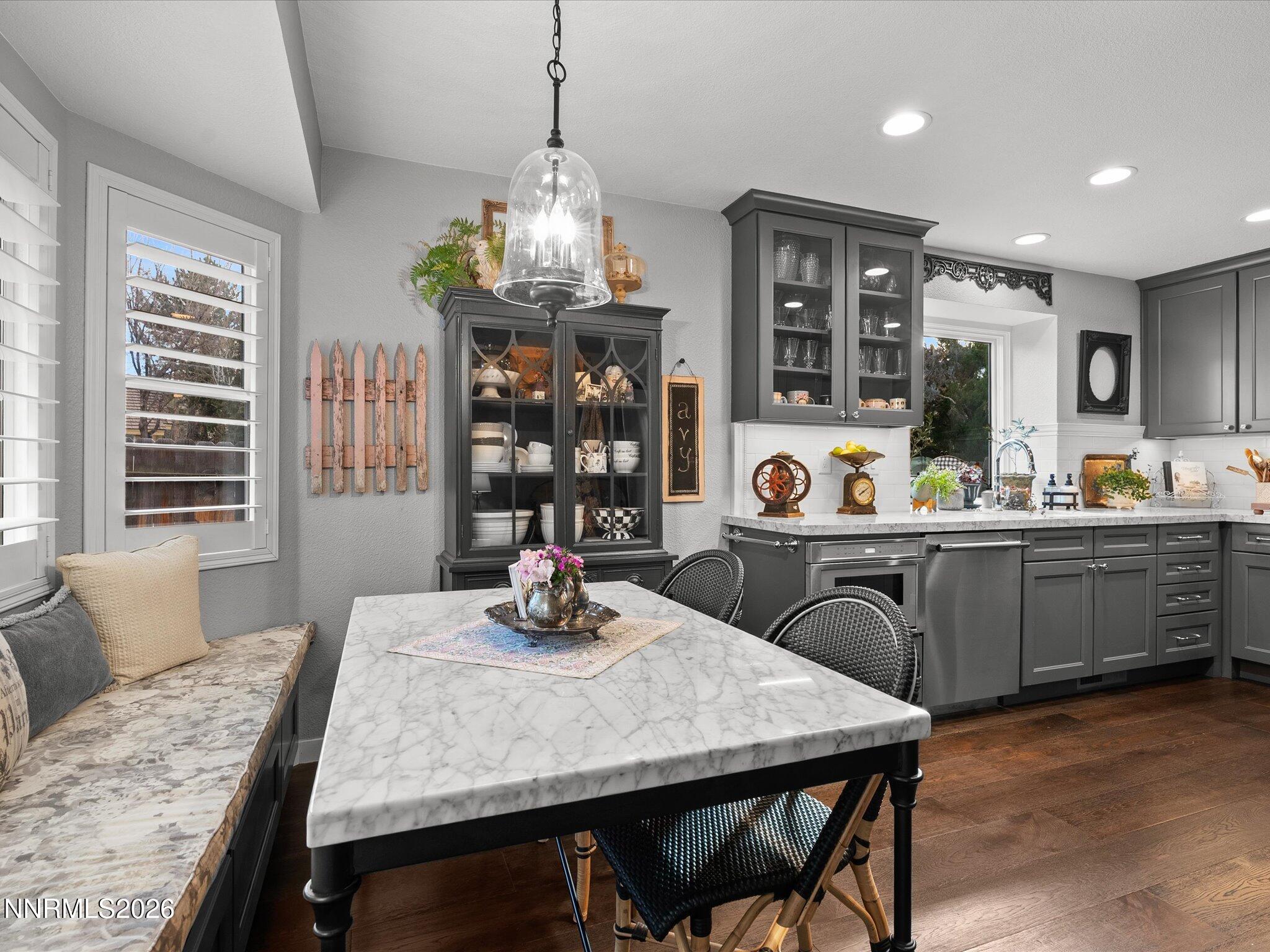 1164 Mayflower Drive Reno, NV 89509 - Photo 11 of 89 a kitchen with a table and chairs in it