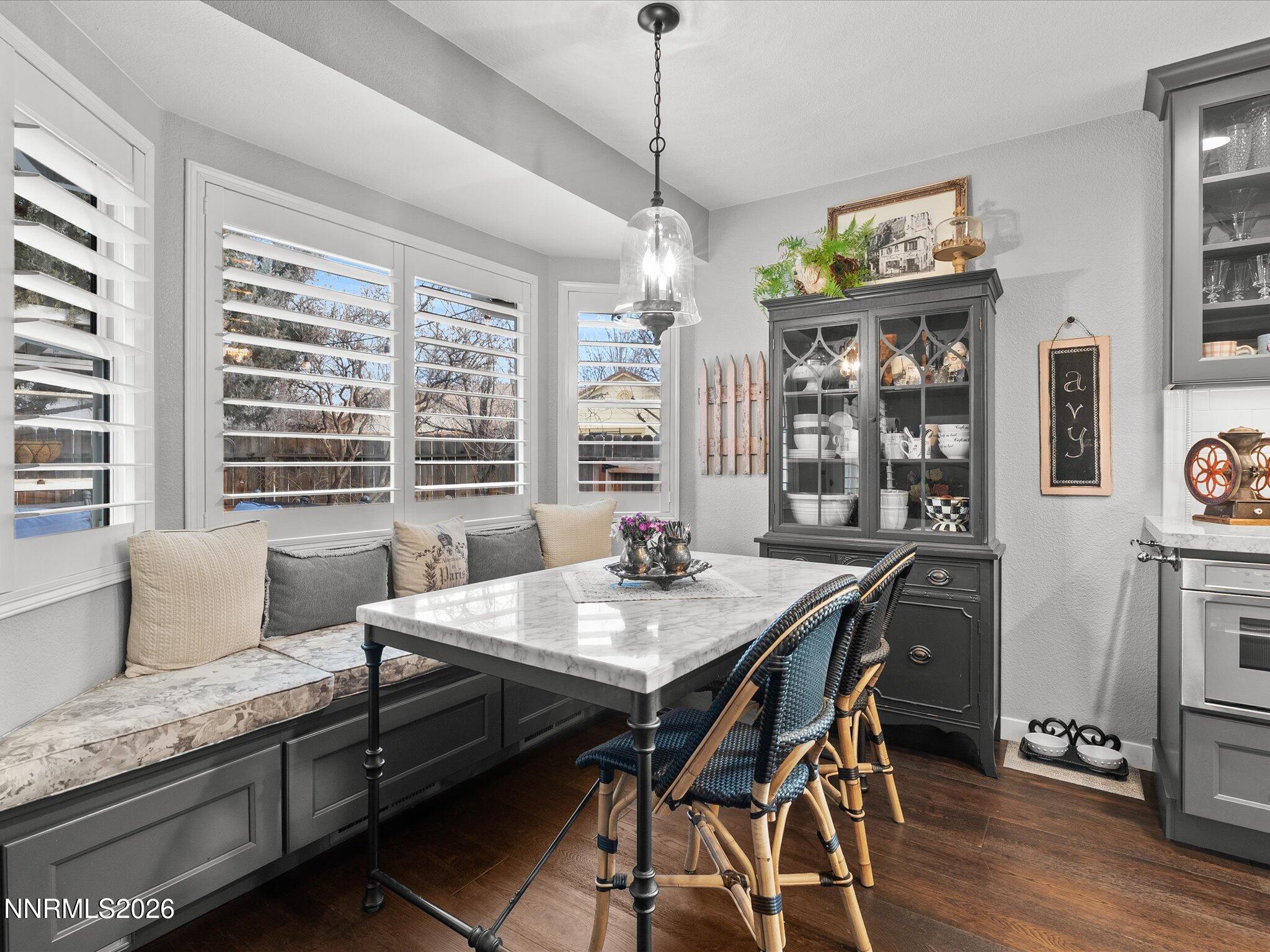 1164 Mayflower Drive Reno, NV 89509 - Photo 12 of 89 a view of a dining room with furniture window and wooden floor