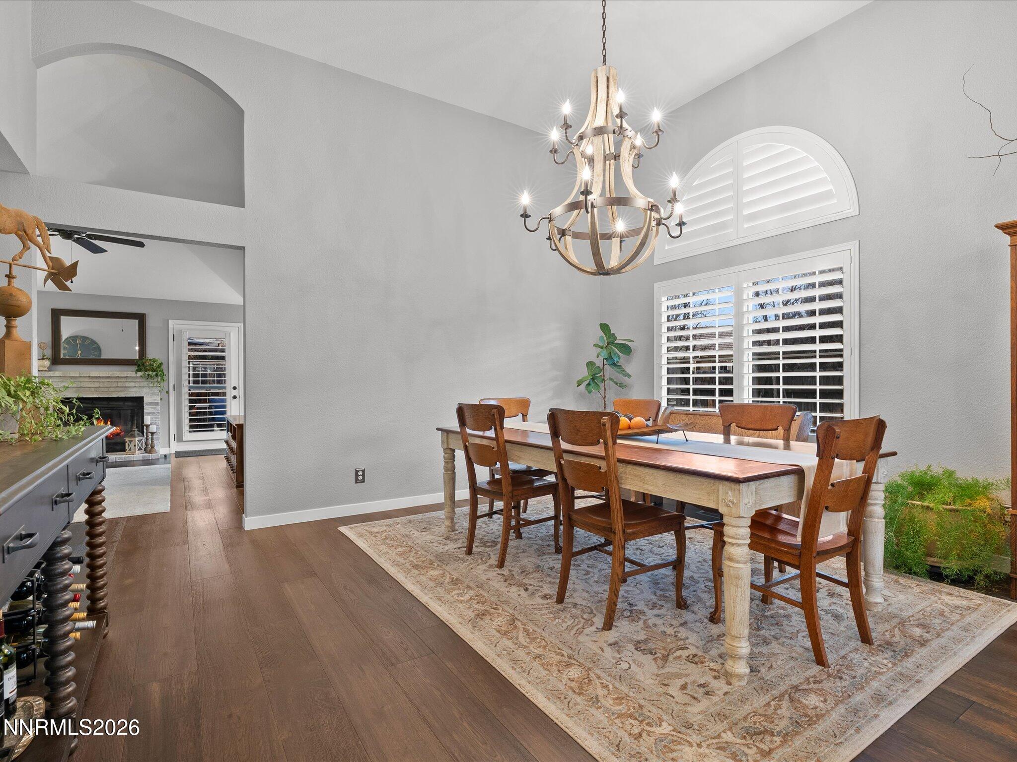 1164 Mayflower Drive Reno, NV 89509 - Photo 19 of 89 a view of a dining room with furniture wooden floor and chandelier