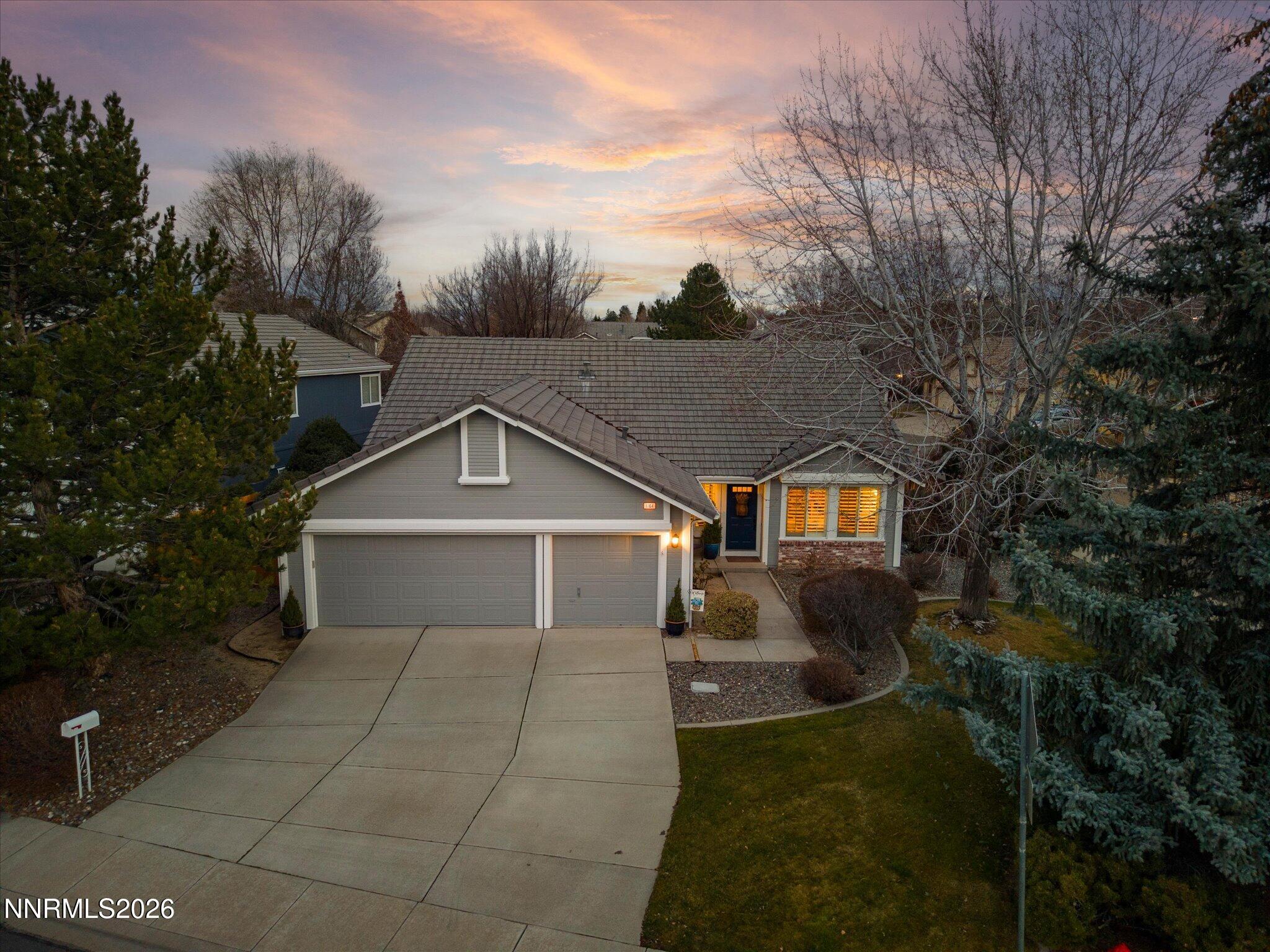 1164 Mayflower Drive Reno, NV 89509 - Photo 2 of 89 a front view of a house with garden