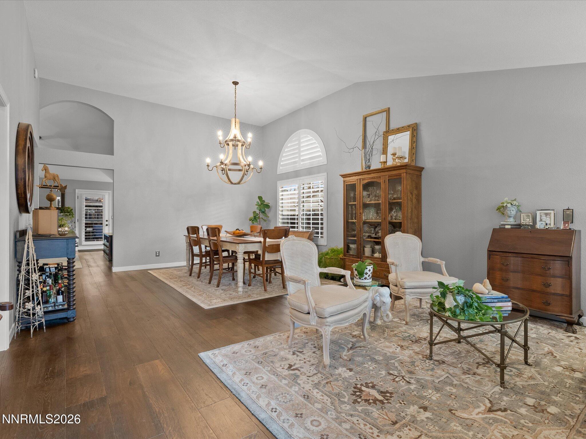 1164 Mayflower Drive Reno, NV 89509 - Photo 21 of 89 a living room with fireplace furniture and a chandelier
