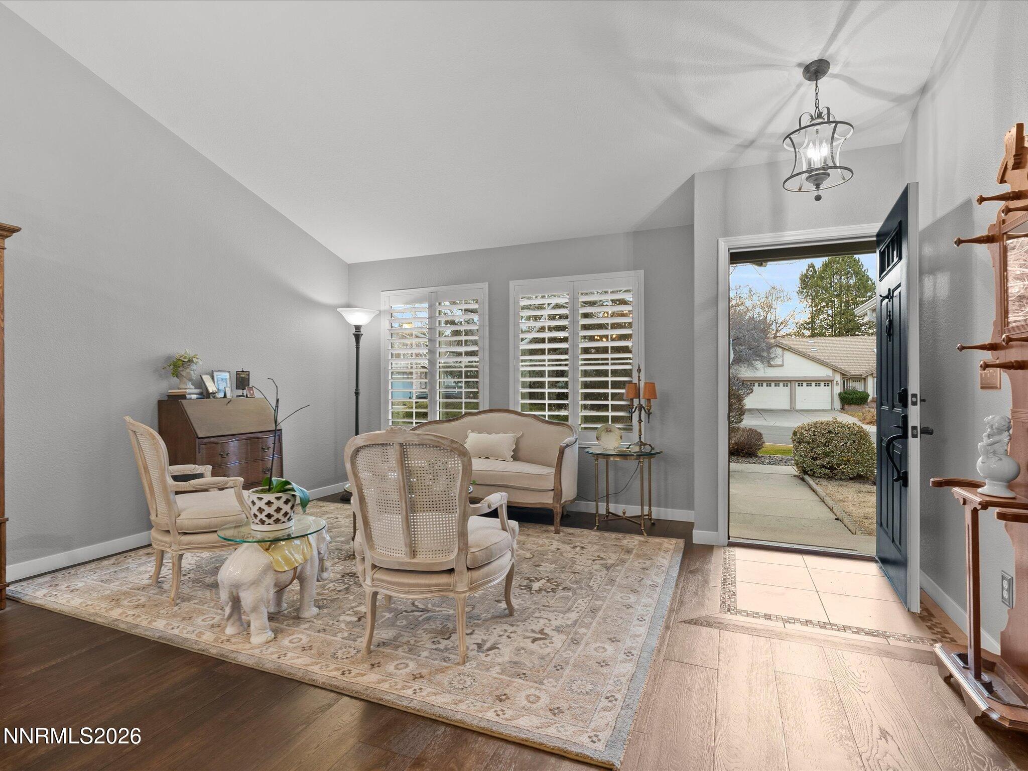 1164 Mayflower Drive Reno, NV 89509 - Photo 22 of 89 a living room with furniture and a floor to ceiling window