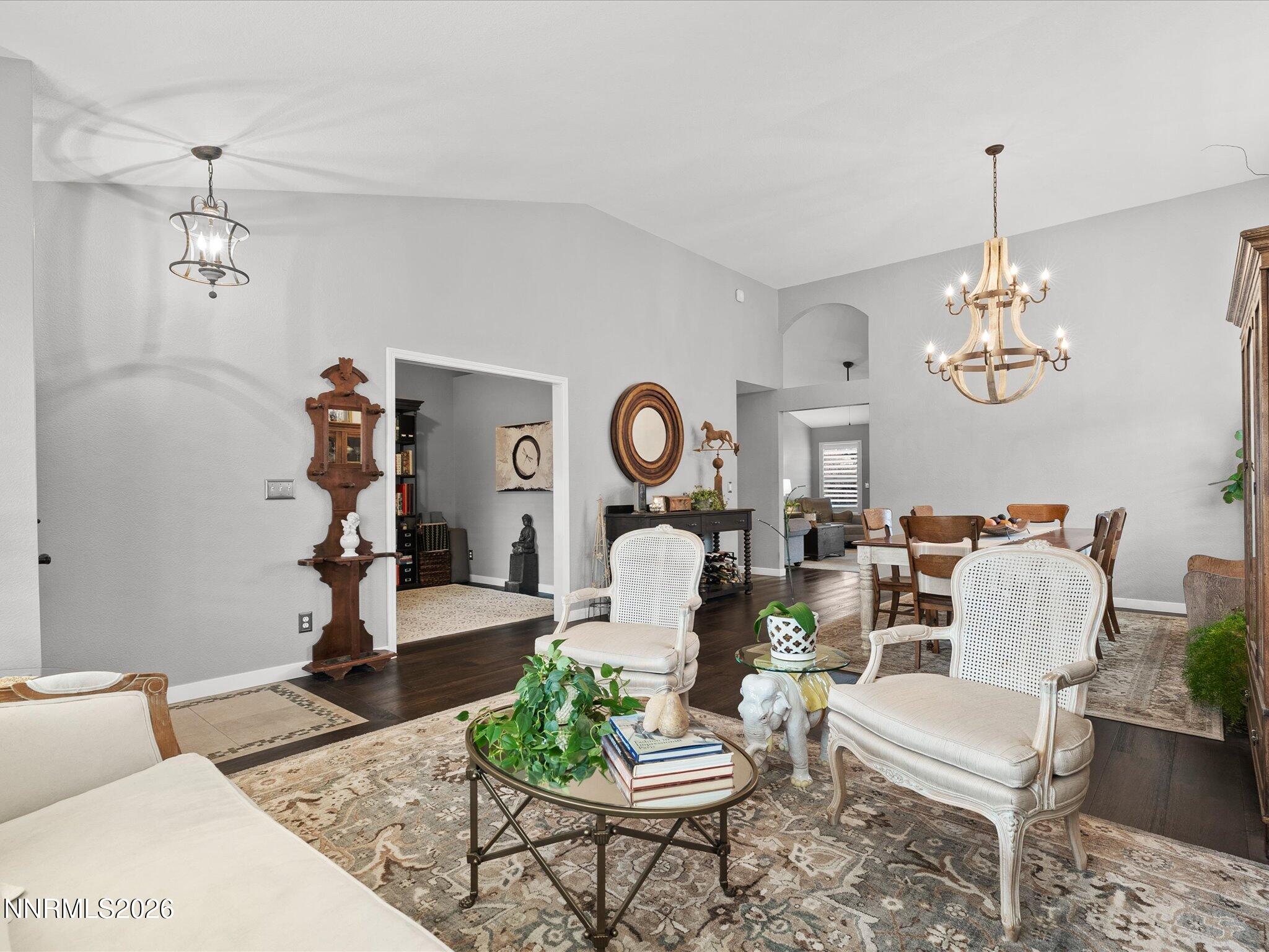 1164 Mayflower Drive Reno, NV 89509 - Photo 23 of 89 a living room with furniture a chandelier and a window