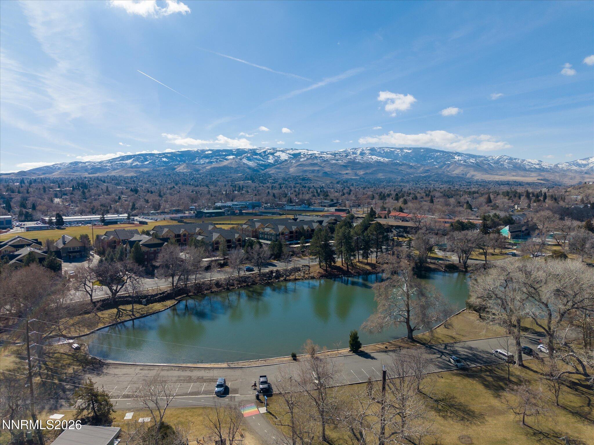 1164 Mayflower Drive Reno, NV 89509 - Photo 71 of 89 an aerial view of residential houses with outdoor space and lake view