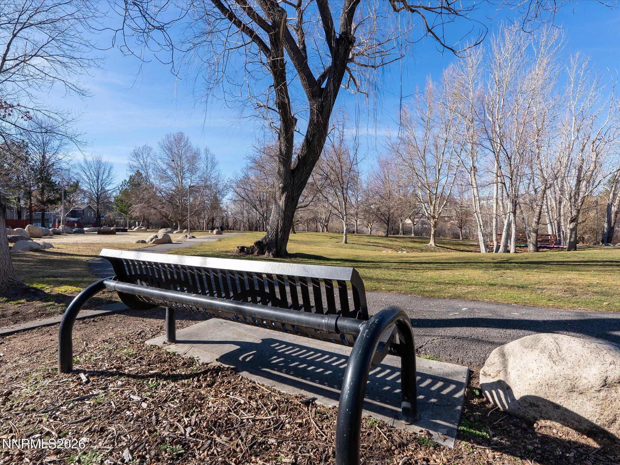 1164 Mayflower Drive Reno, NV 89509 - Photo 81 of 89 a view of a bench in a backyard