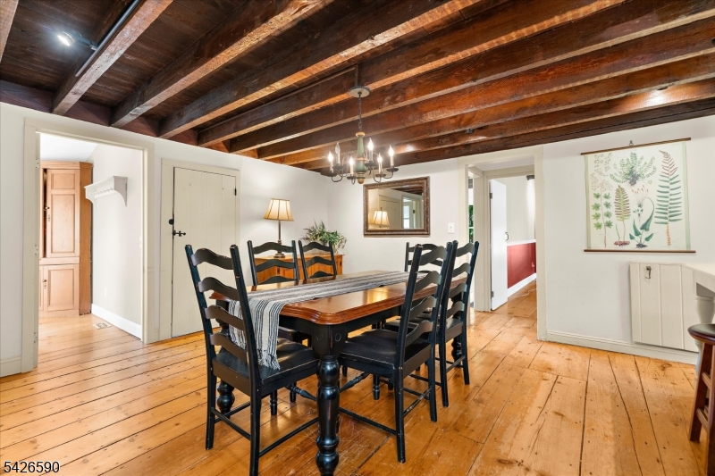 179 Lindbergh Road Hopewell, NJ 08525 - Photo 9 of 46 a view of a dining room with furniture window and wooden floor