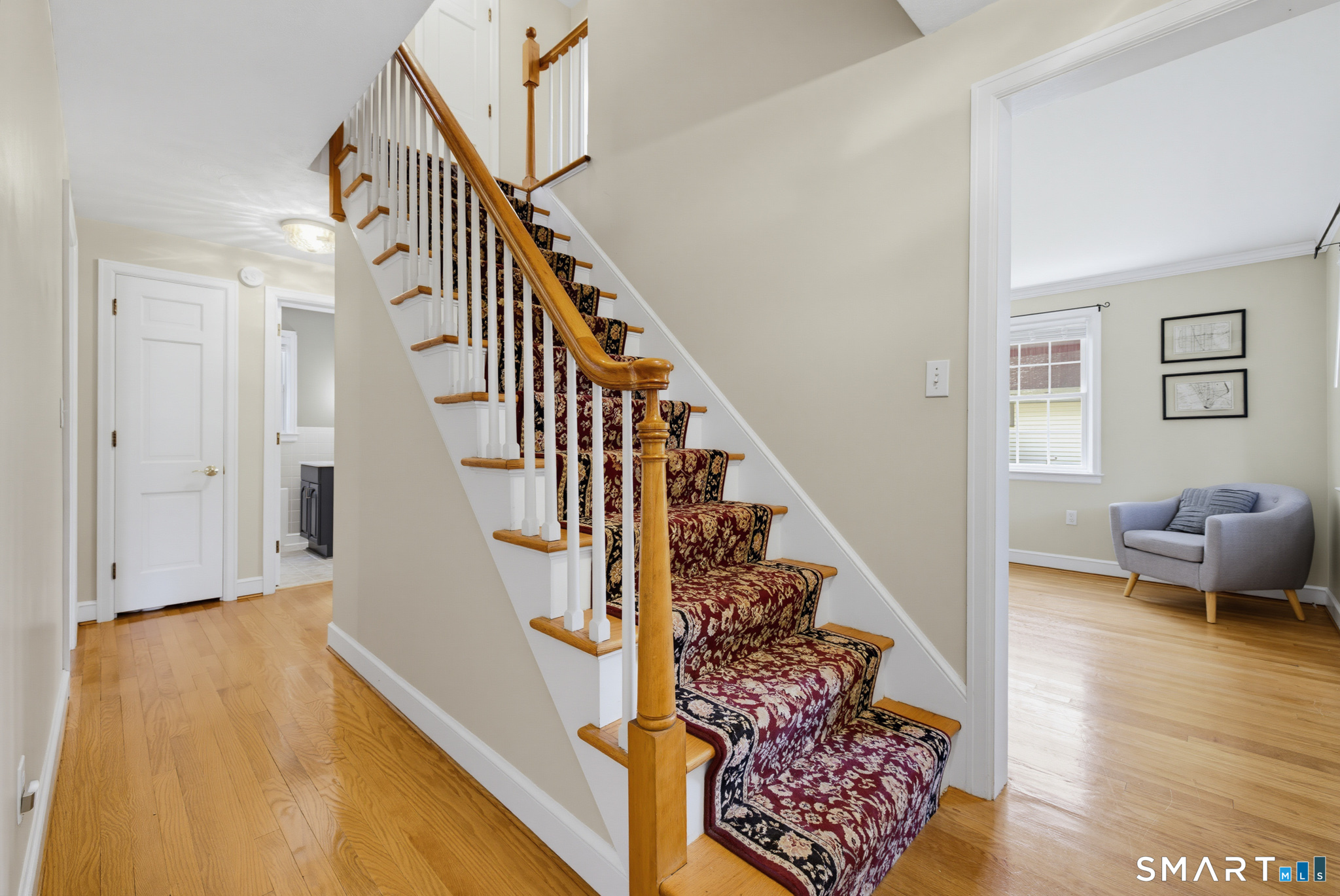 224 Spring Street Manchester, CT 06040 - Photo 15 of 39 a view of entryway and hall with wooden floor