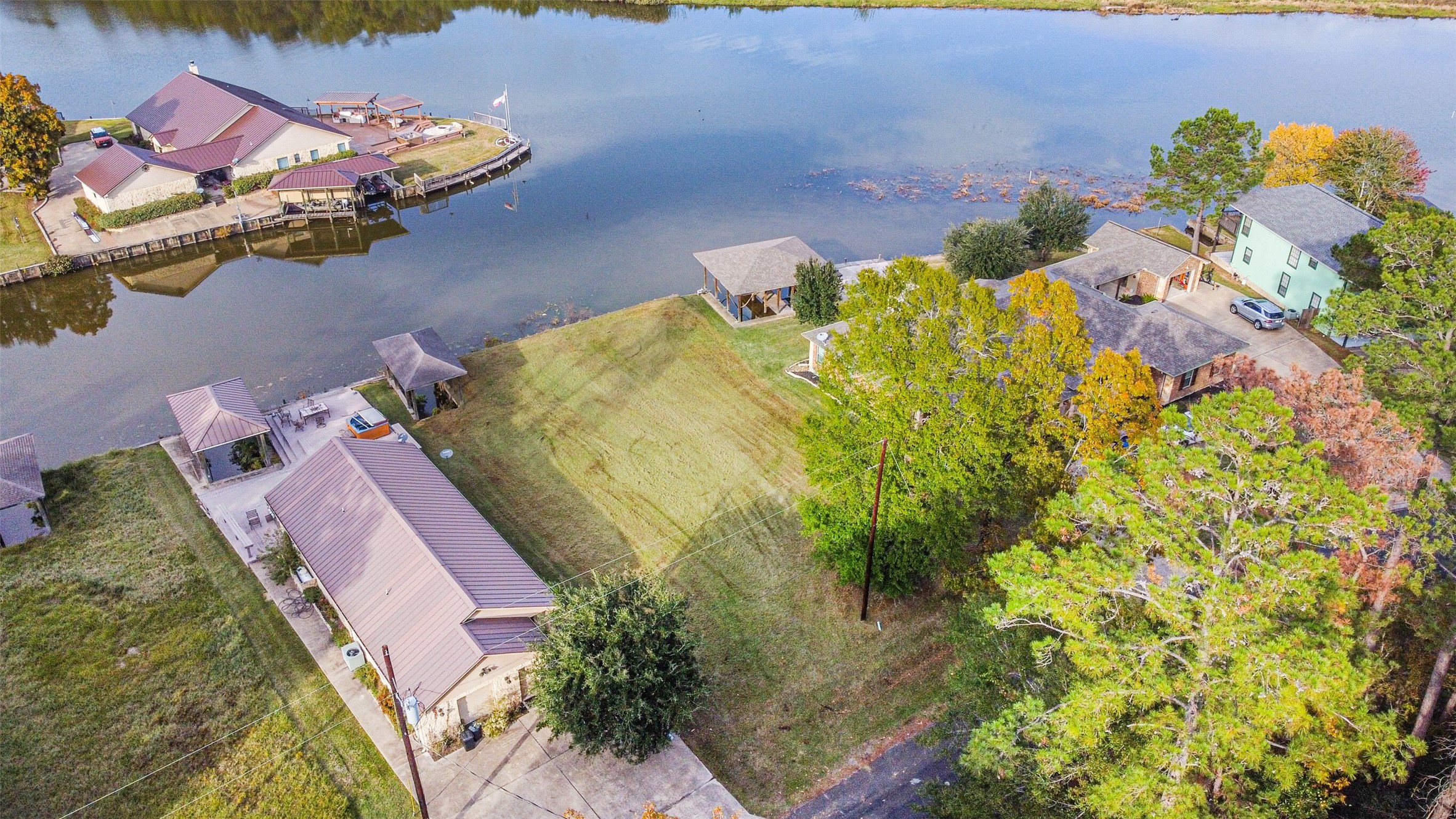 0 Lakeway Drive Trinity, TX 75862 - Photo 2 of 21 a aerial view of a house with swimming pool lawn chairs and a yard