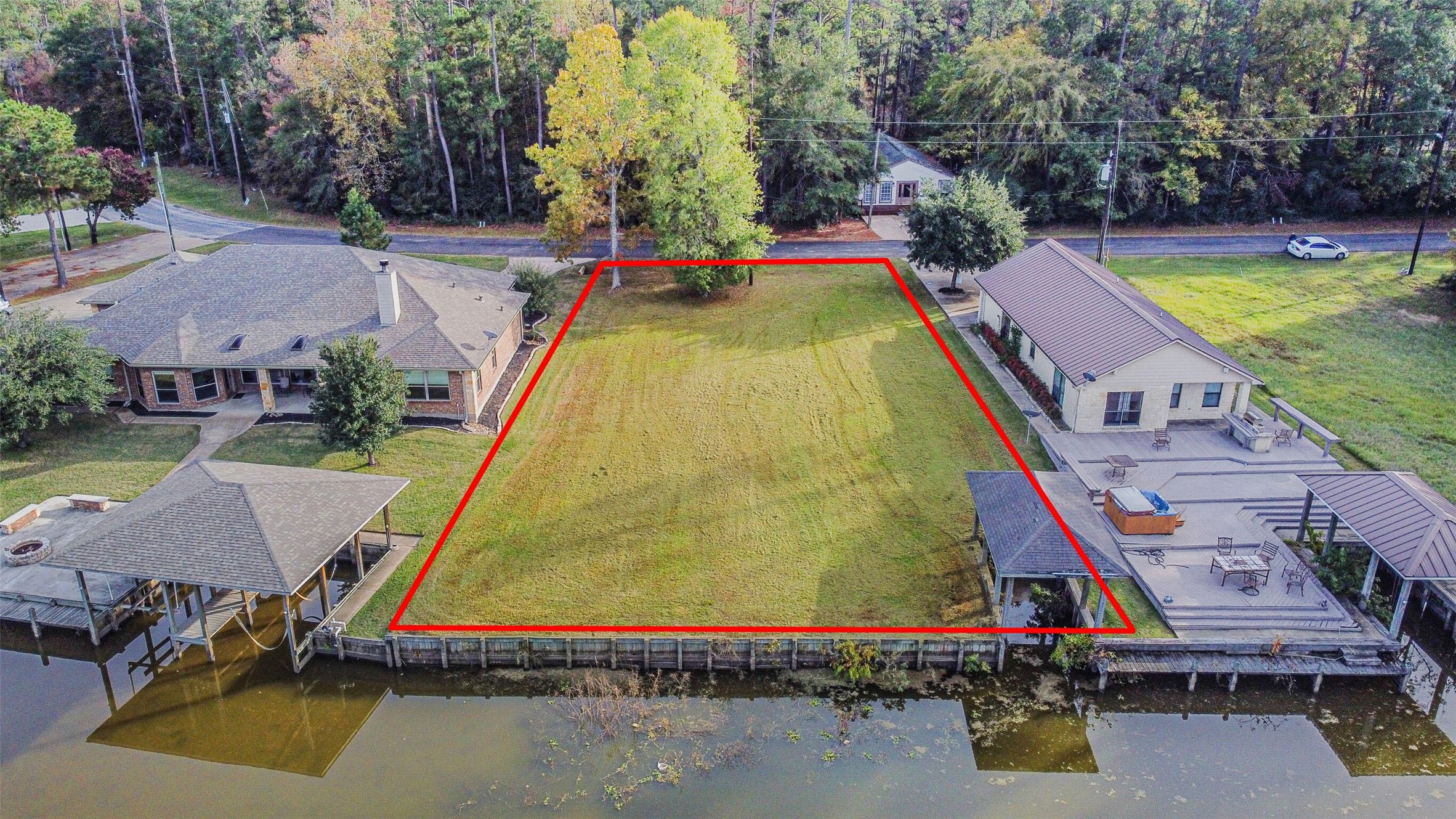 0 Lakeway Drive Trinity, TX 75862 - Photo 3 of 21 an aerial view of a house with swimming pool and large trees