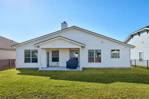 a house view with a outdoor space