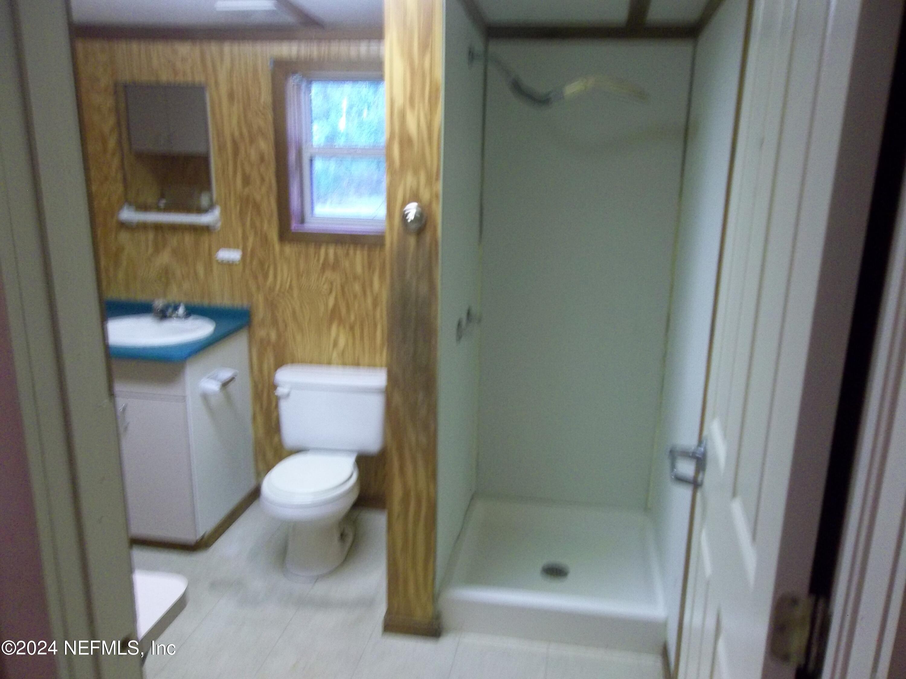 95182 Santa Juana Road Fernandina Beach, FL 32034 - Photo 15 of 20 a bathroom with a toilet and a shower