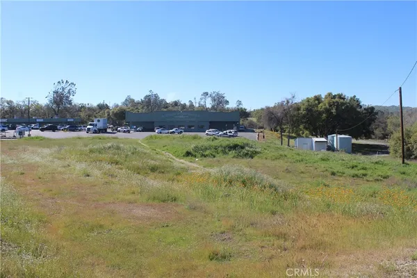 a view of a lake with a big yard