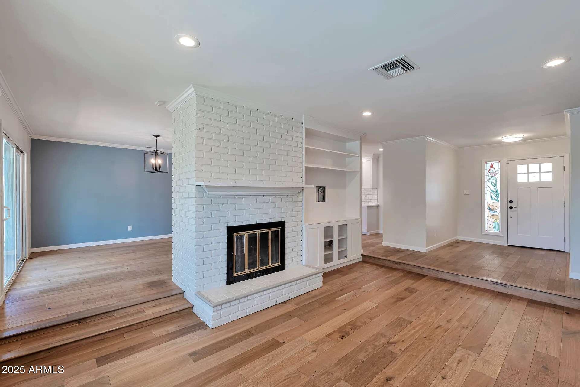 5401 East Beck Lane Scottsdale, AZ 85254 - Photo 5 of 24 Family, dining and fireplace