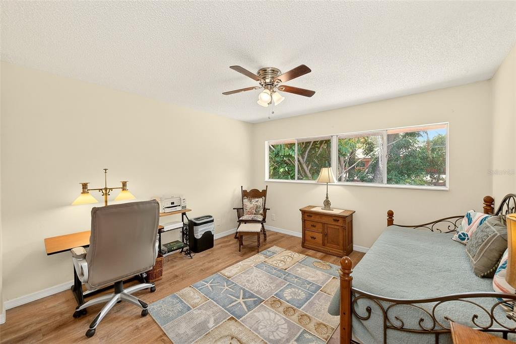 2064 Sunset Point Road, Unit 73 Clearwater, FL 33765 - Photo 29 of 58 a work room with furniture and window