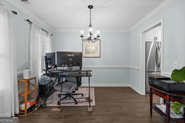 a view of a workspace with furniture