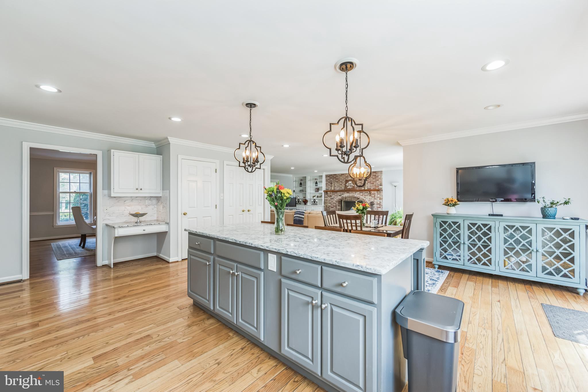 717 Evans Road Lower Gwynedd, PA 19002 - Photo 17 of 35 a kitchen with stainless steel appliances granite countertop a sink dishwasher and a flat screen tv with kitchen view