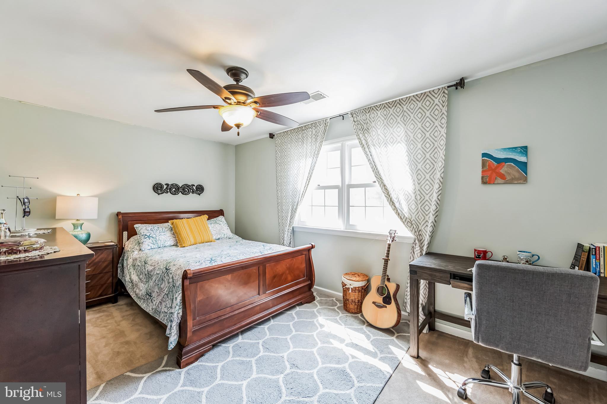 717 Evans Road Lower Gwynedd, PA 19002 - Photo 25 of 35 a bedroom with a bed and a window