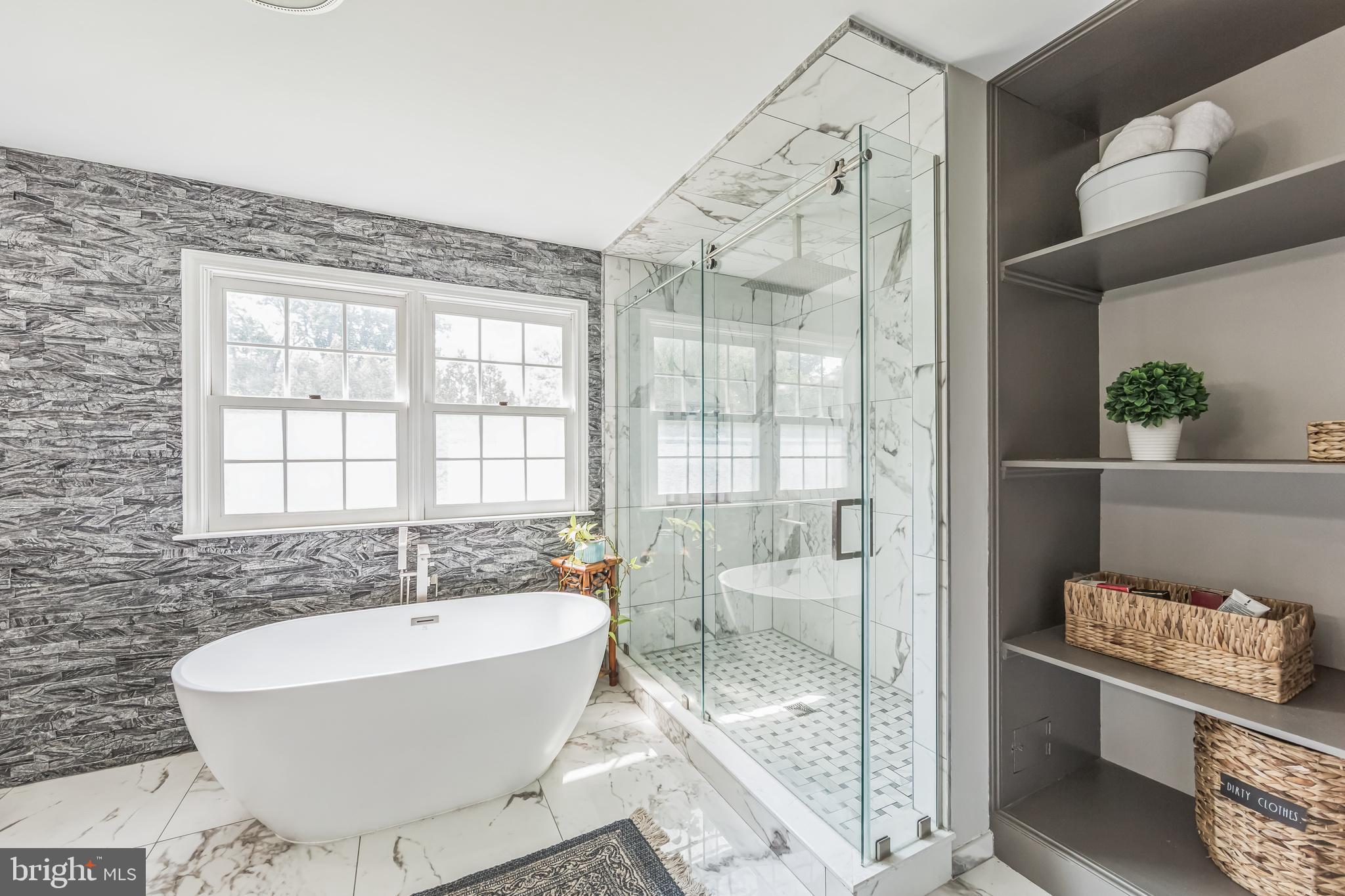 717 Evans Road Lower Gwynedd, PA 19002 - Photo 30 of 35 a bathroom with a bathtub and shower