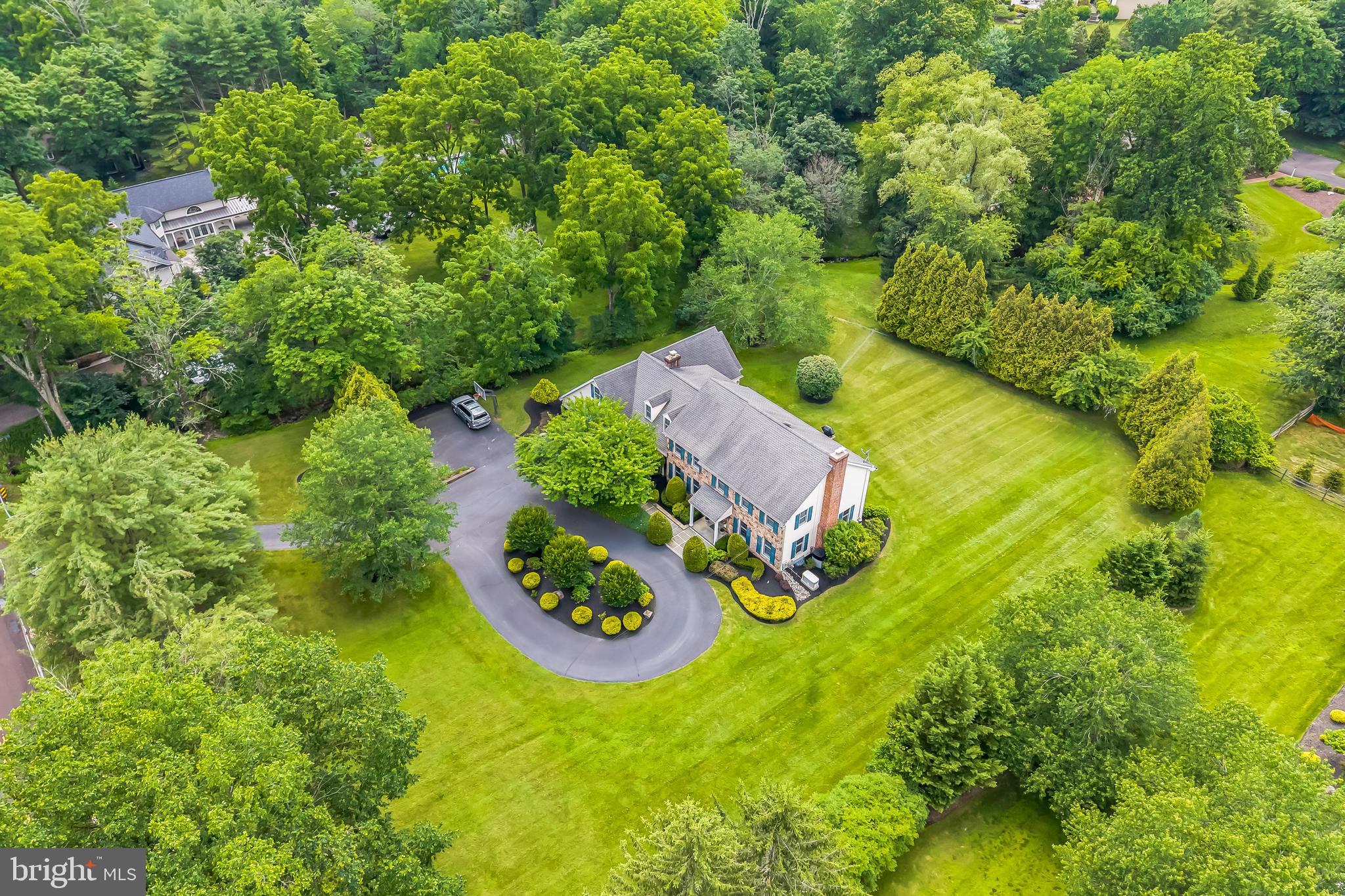 717 Evans Road Lower Gwynedd, PA 19002 - Photo 7 of 35 a view of a back yard of the tree