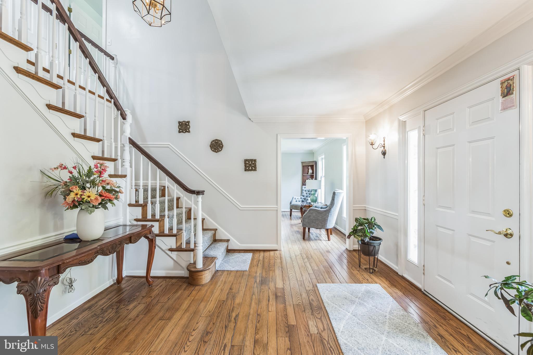 717 Evans Road Lower Gwynedd, PA 19002 - Photo 9 of 35 a view of entryway and hall with wooden floor