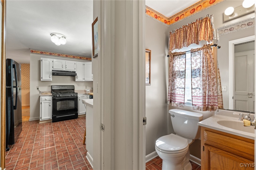 5457 Amidon Road LaFayette, NY 13084 - Photo 18 of 50 Half bath right next to kitchen