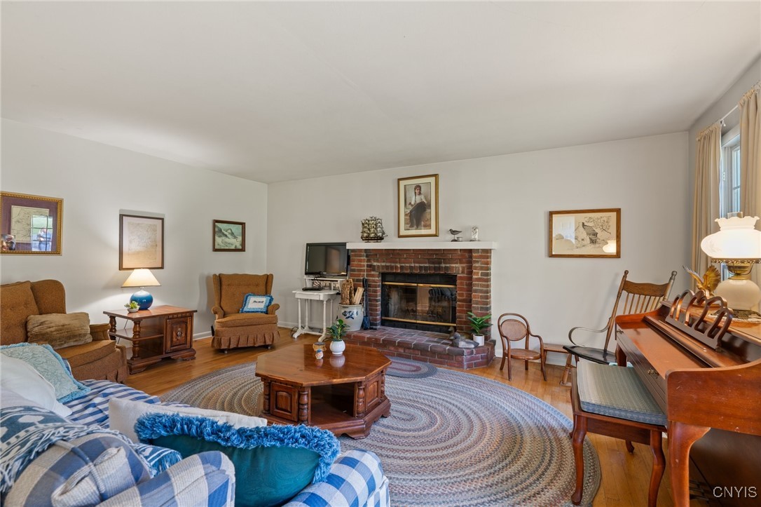 5457 Amidon Road LaFayette, NY 13084 - Photo 7 of 50 Spacious living room with a cozy well maintained w