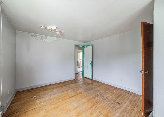 3721 Oakton Road Pittsburgh, PA 15227 - Photo 16 of 25 wooden floor in an empty room with a window
