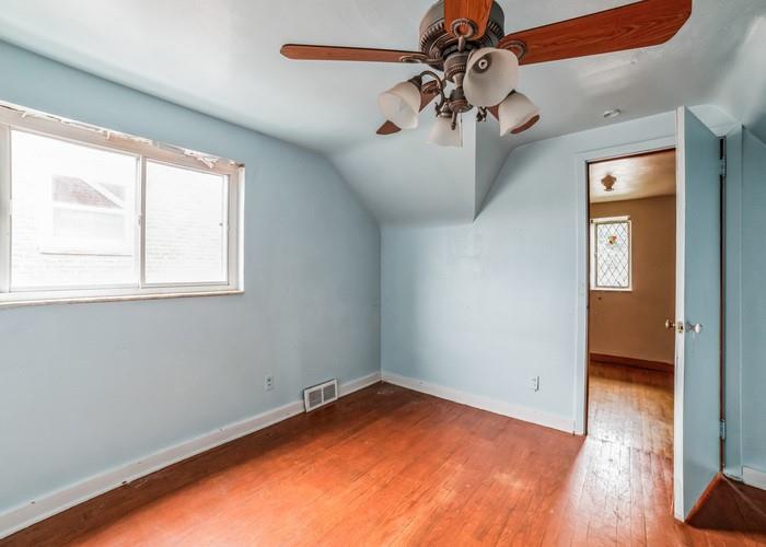 3721 Oakton Road Pittsburgh, PA 15227 - Photo 20 of 25 a view of a room with window and wooden floor