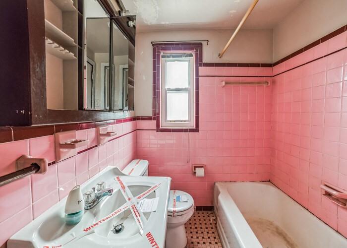 3721 Oakton Road Pittsburgh, PA 15227 - Photo 23 of 25 a bathroom with a sink a toilet and a mirror