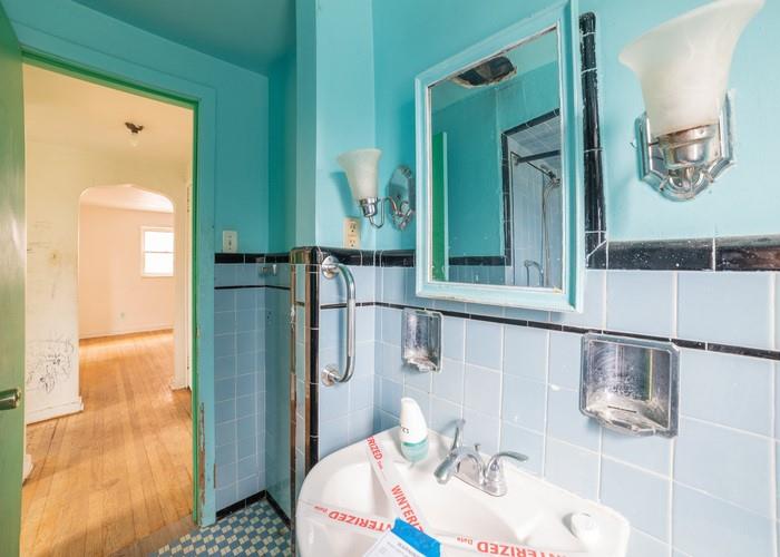 3721 Oakton Road Pittsburgh, PA 15227 - Photo 24 of 25 a bathroom with a sink and a mirror