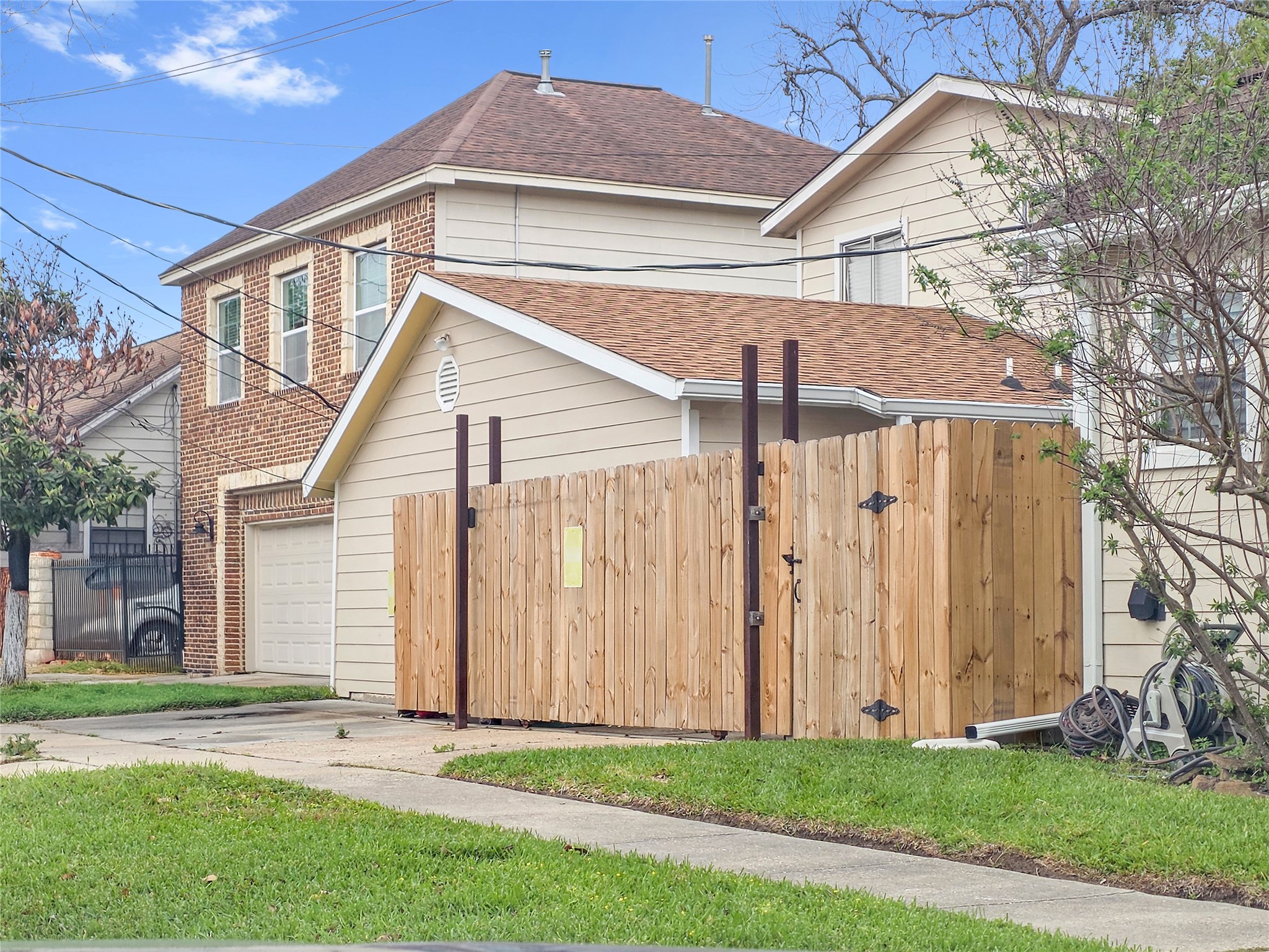 7013 Hemlock Street Houston, TX 77087 - Photo 8 of 8 a front view of a house with a yard