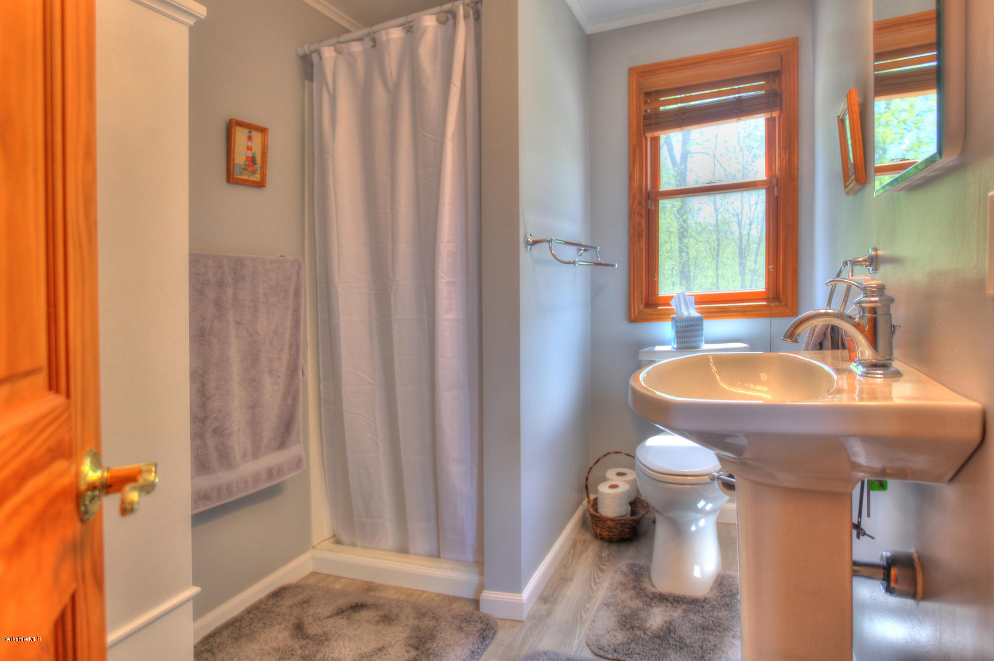 15 Dodd Road Sandisfield, MA 01255 - Photo 16 of 16 a bathroom with a sink a toilet and a mirror