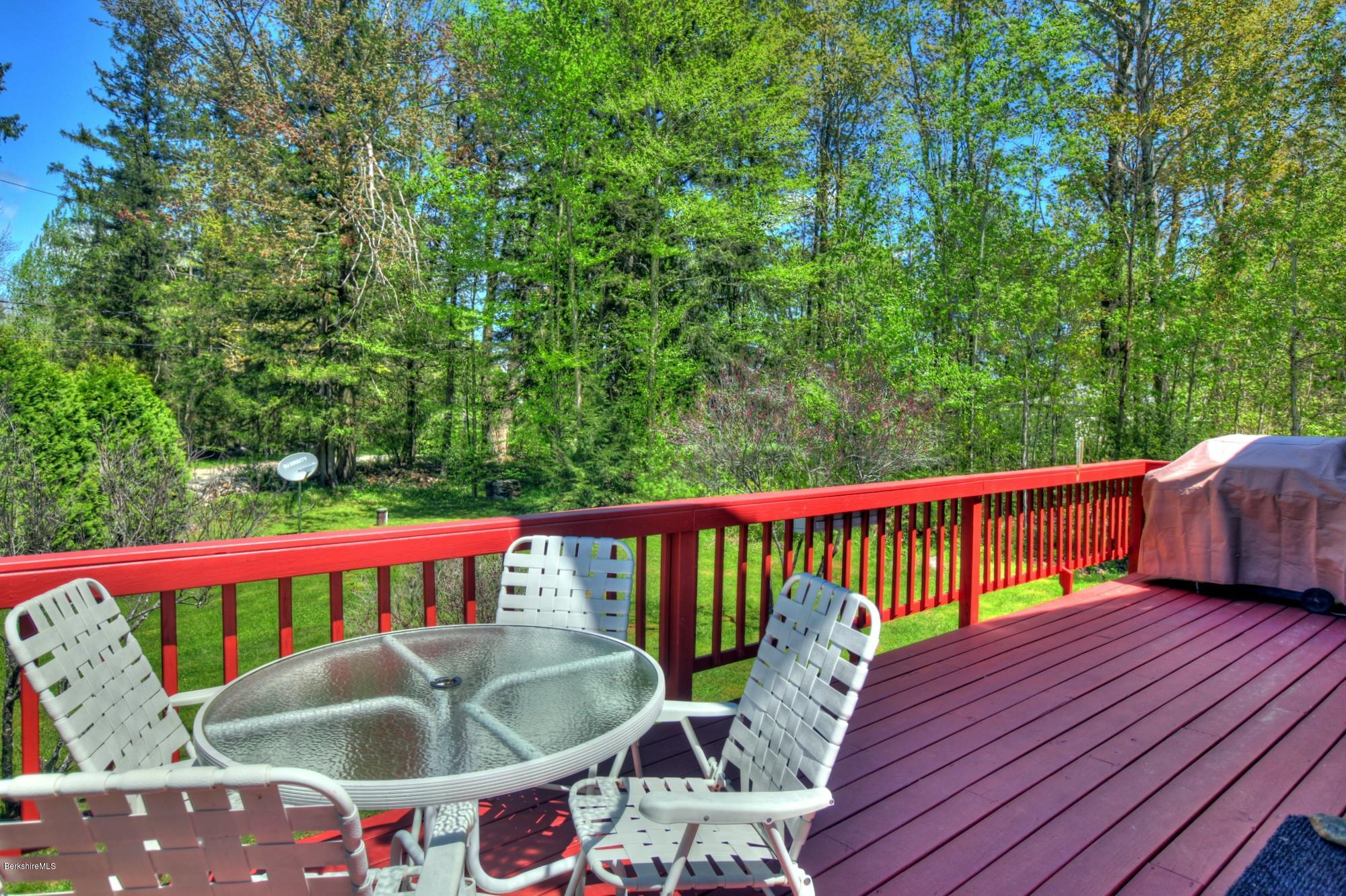 15 Dodd Road Sandisfield, MA 01255 - Photo 7 of 16 a view of a wooden deck with furniture