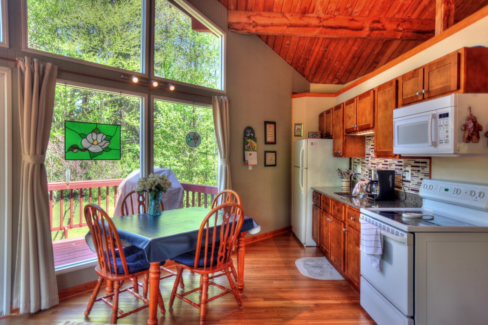 15 Dodd Road Sandisfield, MA 01255 - Photo 9 of 16 a view of a dining room with furniture window and outside view