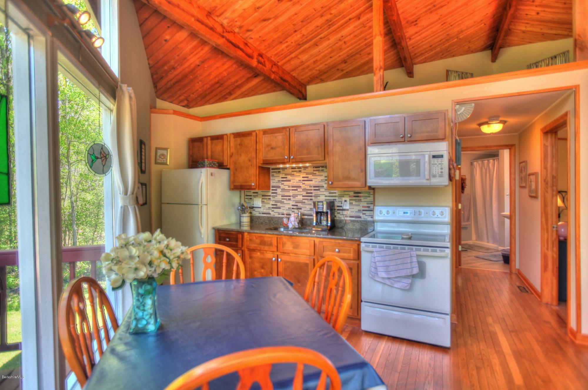 15 Dodd Road Sandisfield, MA 01255 - Photo 10 of 16 a view of a swimming pool with furniture