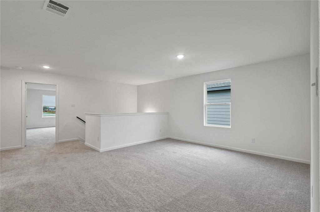 600 Merced River Lane Anna, TX 75409 - Photo 18 of 40 an empty room with a empty space and windows