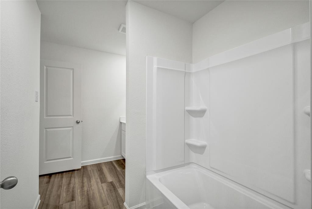 600 Merced River Lane Anna, TX 75409 - Photo 26 of 40 a bathroom with a bathtub