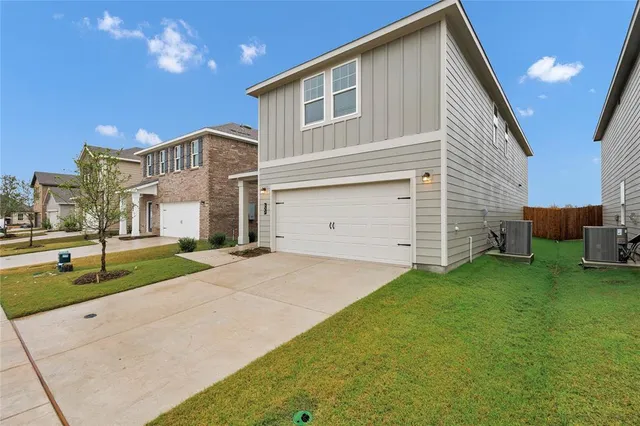 a front view of house with yard