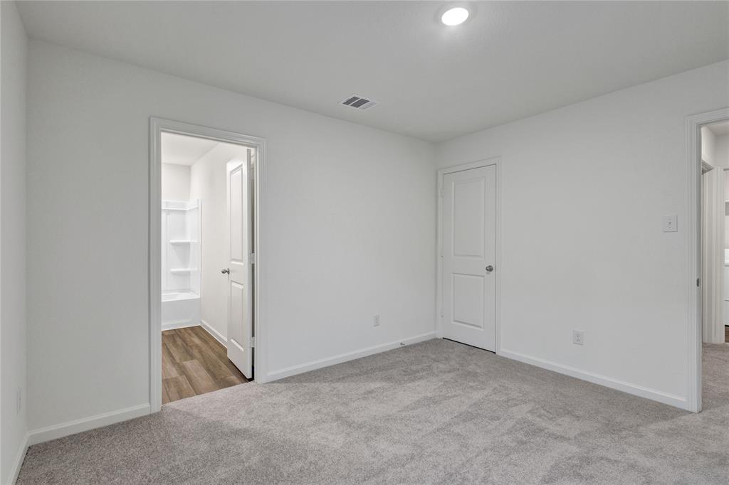 600 Merced River Lane Anna, TX 75409 - Photo 32 of 40 a view of a room that has a sink and glass door