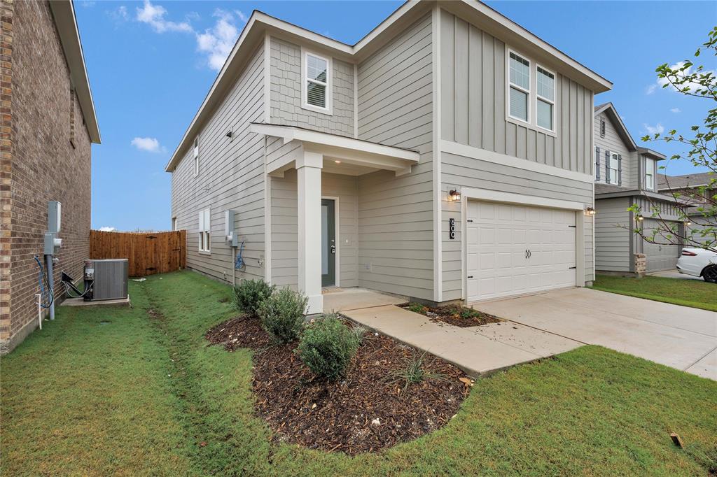 600 Merced River Lane Anna, TX 75409 - Photo 5 of 40 a front view of a house with a yard