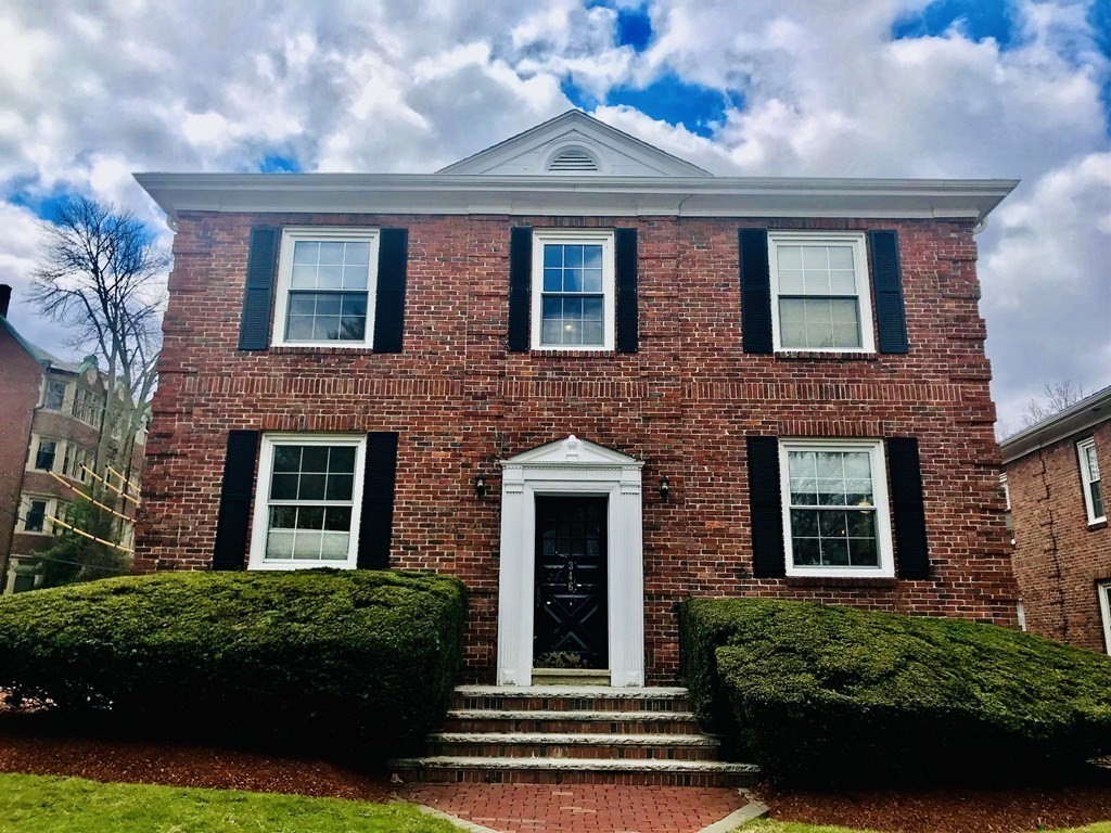 346 Harvard Street, Unit 4 Cambridge, MA 02138 - Photo 1 of 1 a front view of a house with garden
