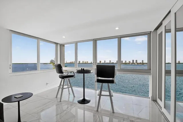 a view of a workspace with furniture