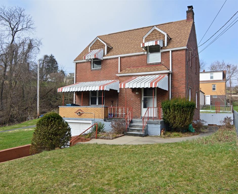 561 Keystone Street Pittsburgh, PA 15215 - Photo 1 of 10 Situated on a level corner lot, this charming brick colonial is an ideal starter home.