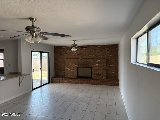 3244 West Yucca Street Phoenix, AZ 85029 - Photo 5 of 21 a view of a livingroom with a fireplace and window
